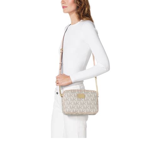 knock off michael kors crossbody|Michael Kors logo.